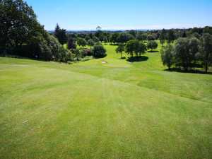 View of golf course from hill